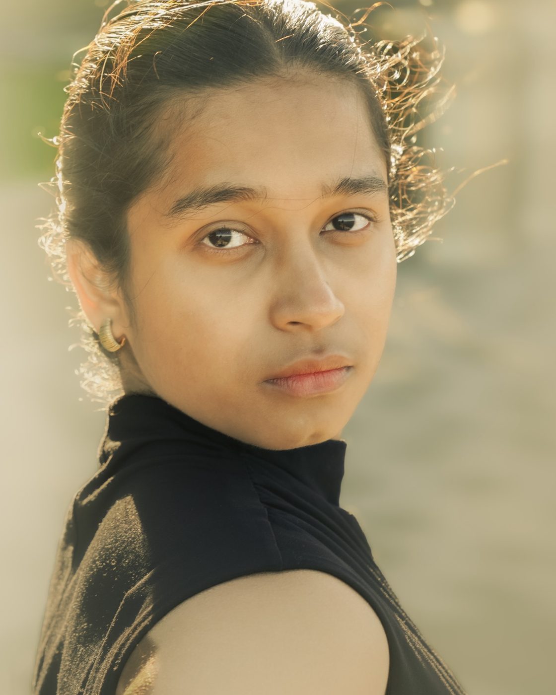 Backlit close-up portrait